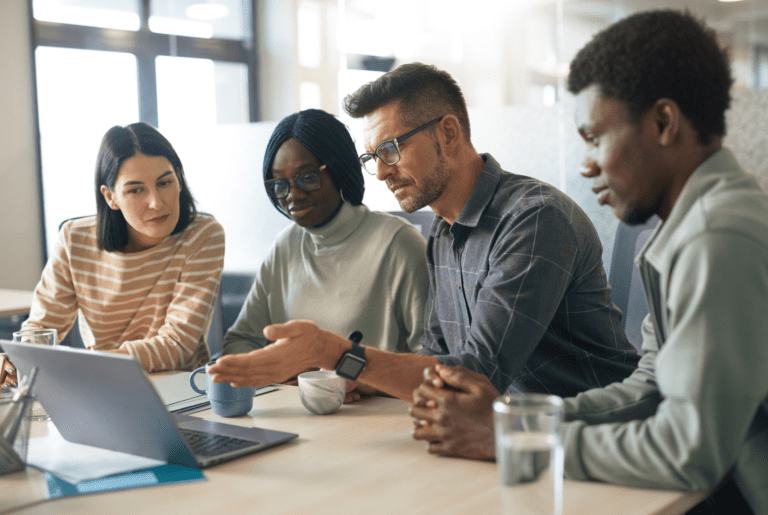 group of people looking at out innovative client management portal