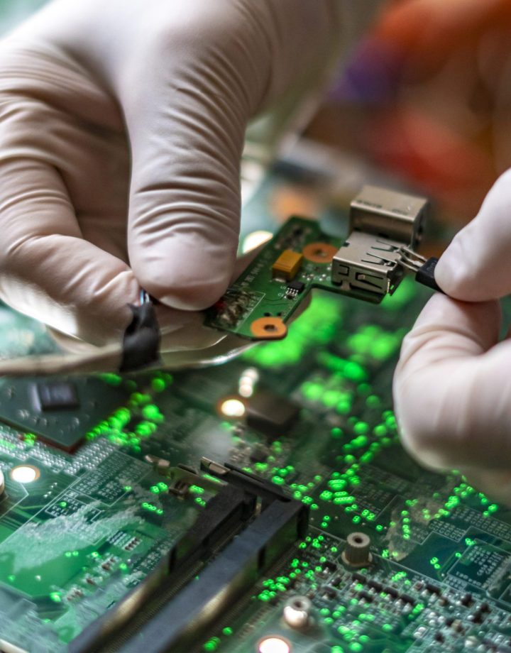 scientist assemble the modern technology gadget pieces in the laboratory