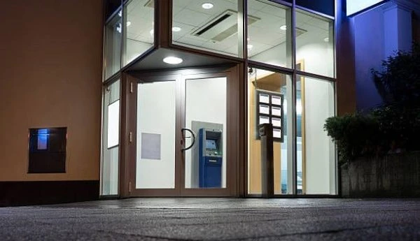 Cashpoint/ATM at night. All recognizable logos and names have been carefully removed in order to create a generic look